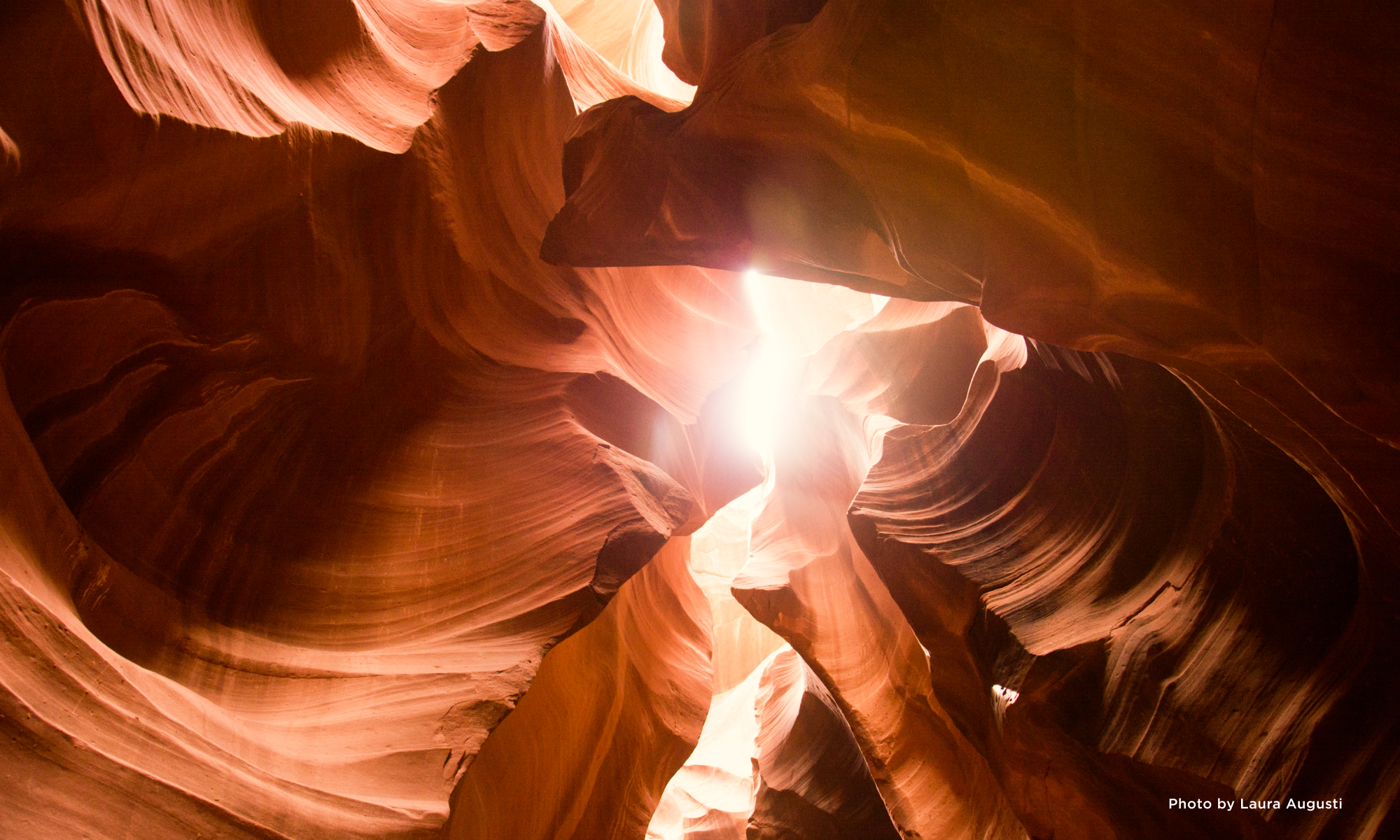 Light filtering through a red canyon.